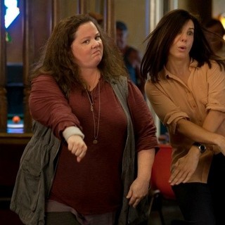 Melissa McCarthy stars as Det. Shannon Mullins and Sandra Bullock stars as Special Agent Sarah Ashburn in 20th Century Fox's The Heat (2013)
