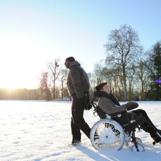 Omar Sy stars as Driss and Francois Cluzet stars as Philippe in The Weinstein Company's The Intouchables (2012)