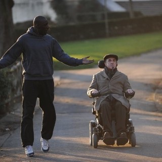 Omar Sy stars as Driss and Francois Cluzet stars as Philippe in The Weinstein Company's The Intouchables (2012)