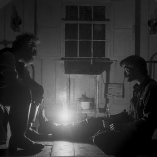 Willem Dafoe stars as Thomas Wake and Robert Pattinson stars as Ephraim Winslow in A24's The Lighthouse (2019)