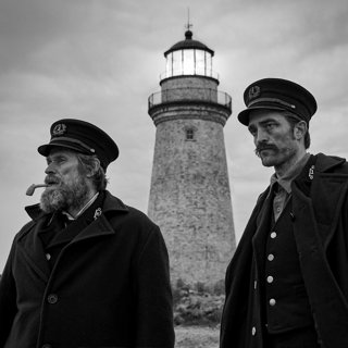 Willem Dafoe stars as Thomas Wake and Robert Pattinson stars as Ephraim Winslow in A24's The Lighthouse (2019)