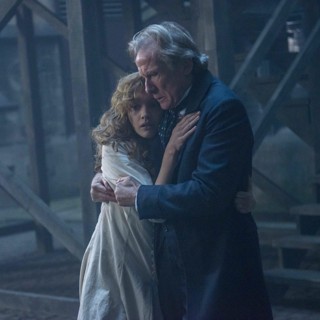 Olivia Cooke stars as Lizzie Cree and Bill Nighy stars as John Kildare in RLJ Entertainment's The Limehouse Golem (2017)