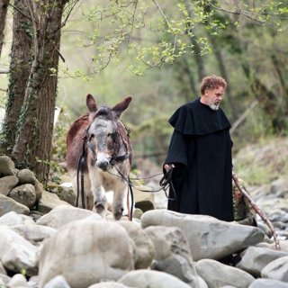 John C. Reilly stars as Father Tommasso in Gunpowder & Sky's The Little Hours (2017)
