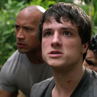 The Rock stars as Hank Parsons and Josh Hutcherson stars as Sean Anderson in Warner Bros. Pictures' Journey 2: The Mysterious Island (2012)