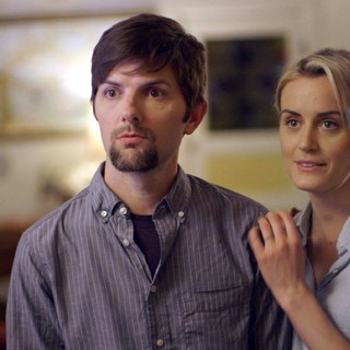 Adam Scott stars as Alex and Taylor Schilling stars as Emily in The Orchard's The Overnight (2015)