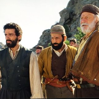 Oscar Isaac, Roman Mitichyan and Rade Serbedzija in Open Road Films' The Promise (2017)