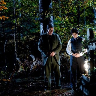 Ciaran Hinds stars as Mr. Daily and Daniel Radcliffe stars as Arthur Kipps in CBS Films' The Woman in Black (2012)