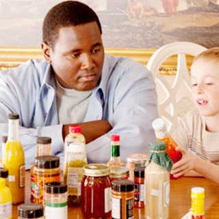 Quinton Aaron stars as Michael Oher and Jae Head stars as S.J. in The 20th Century Fox's The Blind Side (2009)
