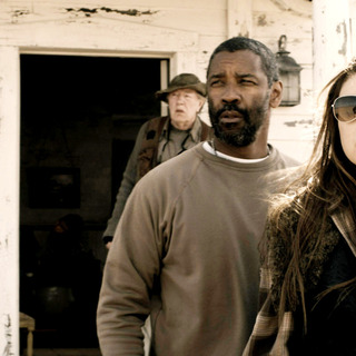 Denzel Washington stars as Eli and Mila Kunis stars as Solara in Warner Bros. Pictures' The Book of Eli (2010)