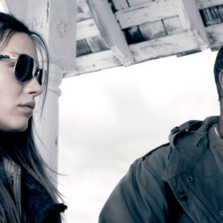 Mila Kunis stars as Solara and Denzel Washington stars as Eli in Warner Bros. Pictures' The Book of Eli (2010)