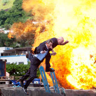 Eric Roberts stars as Monroe and Steve Austin stars as Dan Paine in Lionsgate Films' The Expendables (2010)