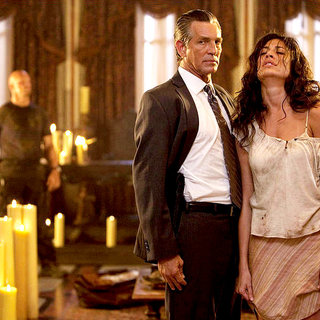 Eric Roberts stars as Monroe and Giselle Itie satrs as Sandra in Lionsgate Films' The Expendables (2010)