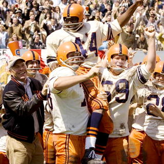 Dennis Quaid stars as Ben Schwartzwalder and Rob Brown stars as Ernie Davis in Universal Pictures' The Express (2008)