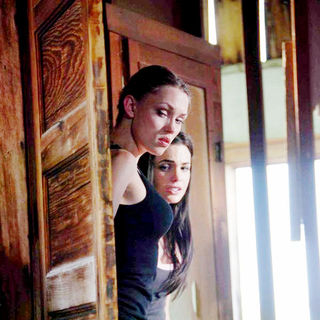Clare Grant stars as Megan Graves and Jillian Murray stars as Abby Graves in After Dark Films' The Graves (2010)