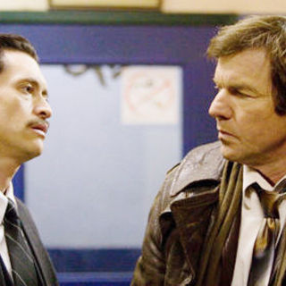 Clifton Collins Jr. stars as Stingray and Dennis Quaid stars as Aidan Breslin in Lions Gate Films' The Horsemen (2009)