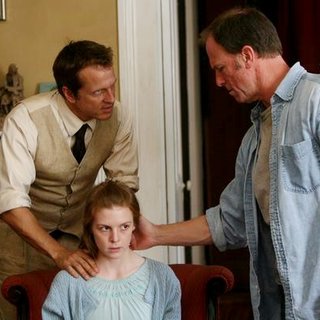 Patrick Fabian stars as Cotton Marcus and Ashley Bell stars as Nell Sweetzer in Lionsgate Films' The Last Exorcism (2010)