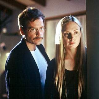 Greg Kinnear and Hope Davis in Miramax Films' THE MATADOR (2005)