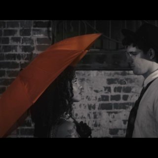 The Orange Umbrella Picture 1