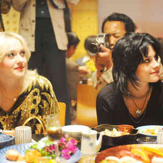 Dakota Fanning stars as Cherie Currie and Kristen Stewart stars as Joan Jett in Apparition's The Runaways (2010)