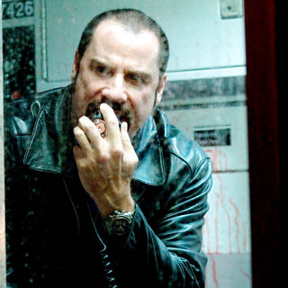John Travolta stars as Ryder in Columbia Pictures' The Taking of Pelham 123 (2009). Photo credit by Rico Torres.