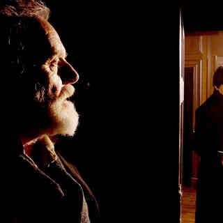 Anthony Hopkins stars as Sir John Talbot and Benicio Del Toro stars as Lawrence Talbot in Universal Pictures' The Wolfman (2009)
