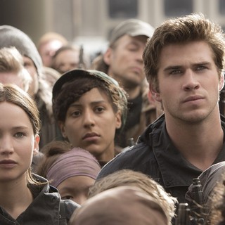 Jennifer Lawrence stars as Katniss Everdeen and Liam Hemsworth stars as Gale Hawthorne in Lionsgate Films' The Hunger Games: Mockingjay, Part 2 (2015)