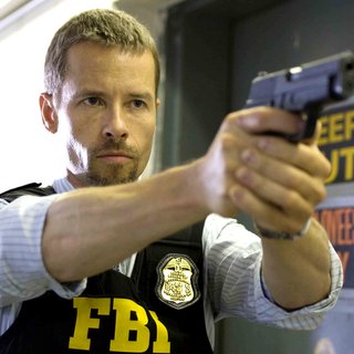 Guy Pearce stars as Roy Clayton in Overture Films' Traitor (2008). Photo credit by Rafy.