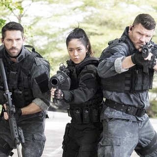 Ron Smoorenburg, Scott Adkins, JeeJa Yanin, Michael Bisping and Michael Jai White in Well Go USA's Triple Threat (2019)