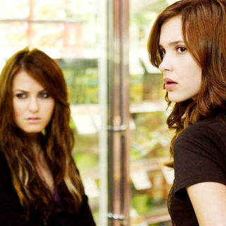 Scout Taylor-Compton stars as Liza Naron and Alexia Fast stars as Eve in Well Go USA's Triple Dog (2010)