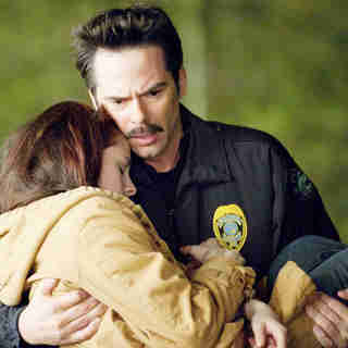 Kristen Stewart stars as Bella Swan and Billy Burke stars as Charlie Swan in Summit Entertainment's The Twilight Saga's New Moon (2009)