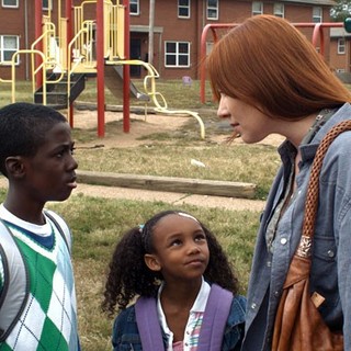 Kwesi Boakye stars as Macon and Lynn Collins stars as Samantha Crawford in Harbinger Media Partners' Unconditional (2012)