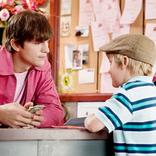 Ashton Kutcher stars as Reed Bennett and Bryce Robinson stars as Edison in New Line Cinema's Valentine's Day (2010)