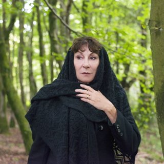 Anjelica Huston stars as Mrs. Aylwood in Lifetime's The Watcher in the Woods (2017)