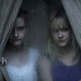 Julia Garner stars as Rose Parker and Ambyr Childers stars as Iris Parker in Entertainment One's We Are What We Are (2014)