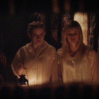 Julia Garner stars as Rose Parker and Ambyr Childers stars as Iris Parker in Entertainment One's We Are What We Are (2014)
