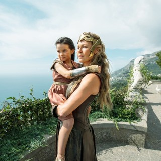 Lilly Aspell stars as Young Diana and Connie Nielsen stars as Queen Hippolyta in Warner Bros. Pictures' Wonder Woman (2017)