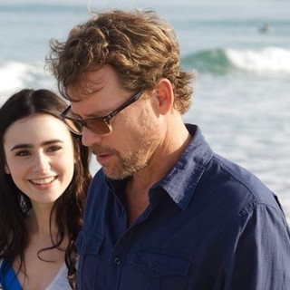 Lily Collins stars as Samantha Borgens and Greg Kinnear stars as William Borgens in Millennium Entertainment's Stuck in Love (2013)