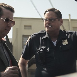 Steve Little stars as Sunshine and Mark Burnham stars as Duke in IFC Midnight's Wrong Cops (2013)