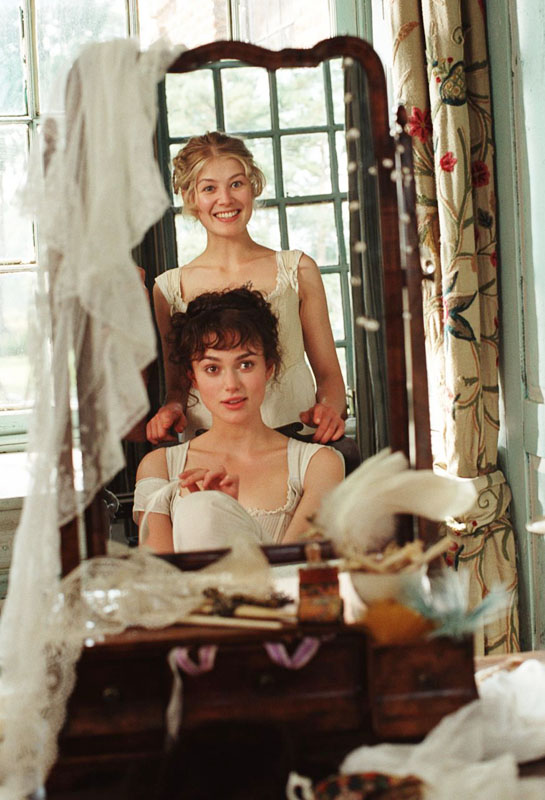 Keira Knightley and Rosamund Pike as Liz and Jane Bennet in PRIDE AND PREJUDICE (2005)