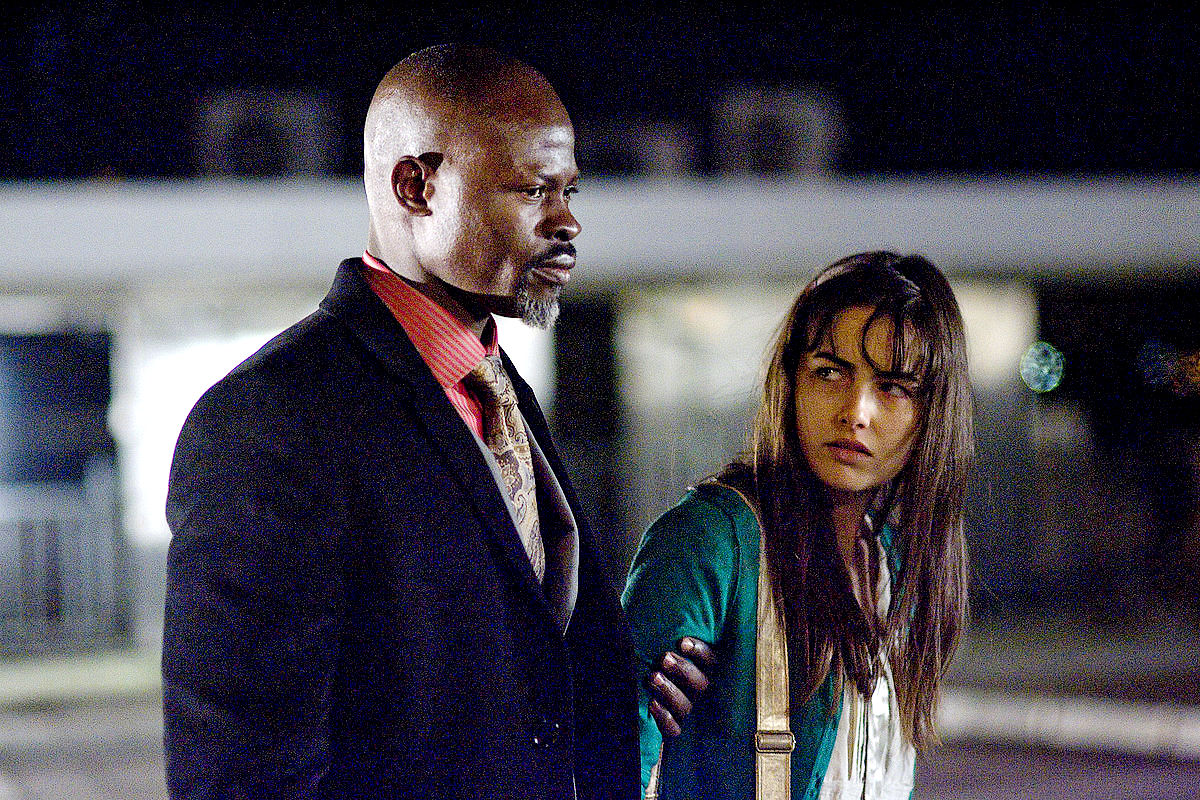 Djimon Hounsou stars as Agent Henry Carver and Camilla Belle stars as Kira Hudson in Summit Entertainment's Push (2009)