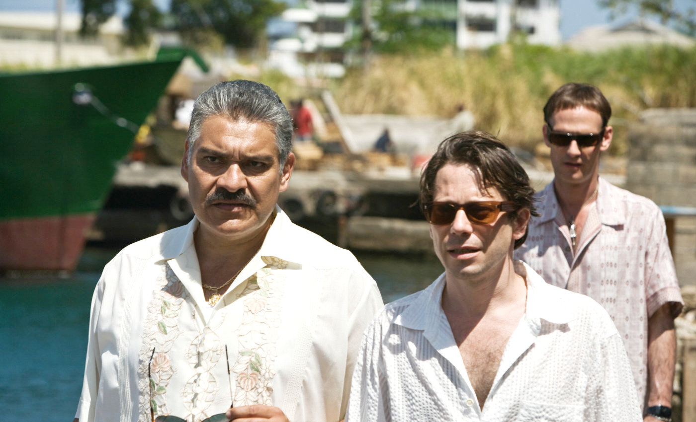 Mathieu Amalric stars as Dominic Greene and Anatole Taubman stars as Elvis in Columbia Pictures' Quantum of Solace (2008)