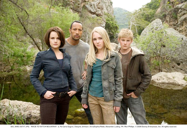 Carla Gugino, The Rock, AnnaSophia Robb and Alexander Ludwig in Walt Disney Pictures' Race to Witch Mountain (2009). Photo credit by Ron Phillips.
