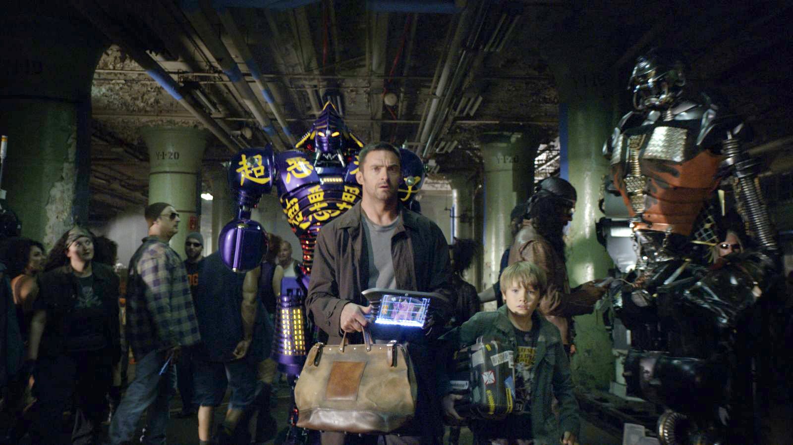 Hugh Jackman stars as Charlie Kenton and Dakota Goyo stars as Max Kenton in Walt Disney Pictures' Real Steel (2011)