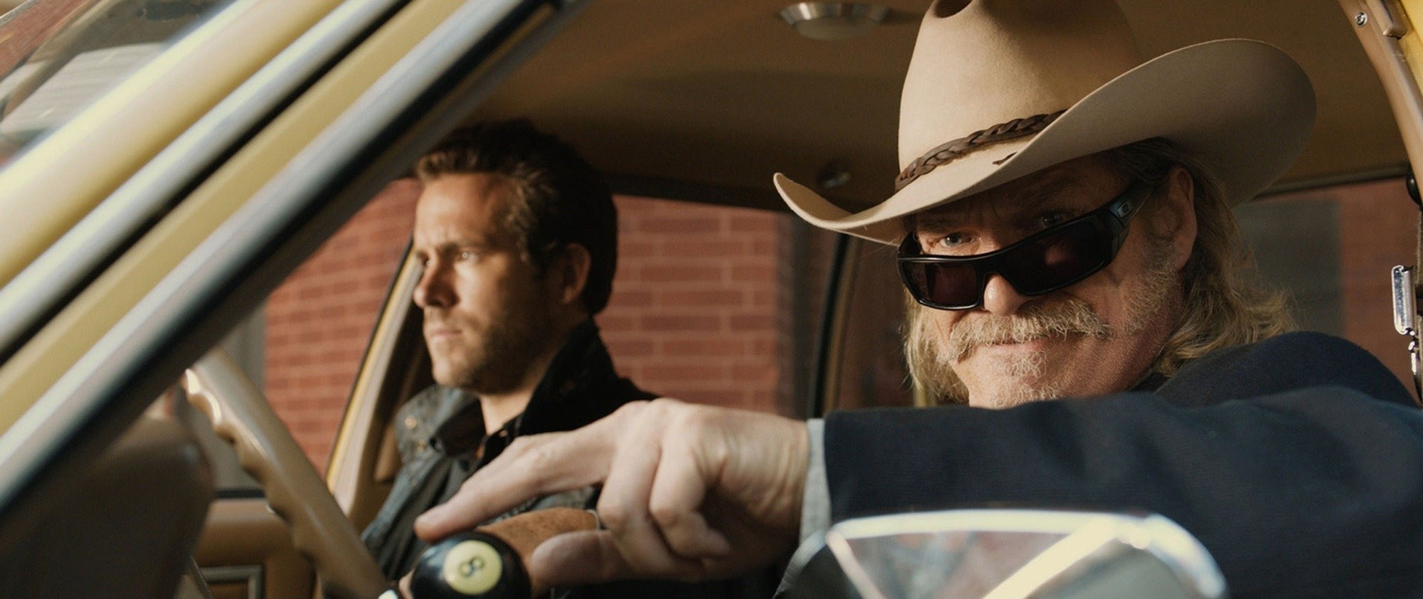 Ryan Reynolds stars as Nick Walker and Jeff Bridges stars as Roy Pulsipher in Universal Pictures' R.I.P.D. (2013)