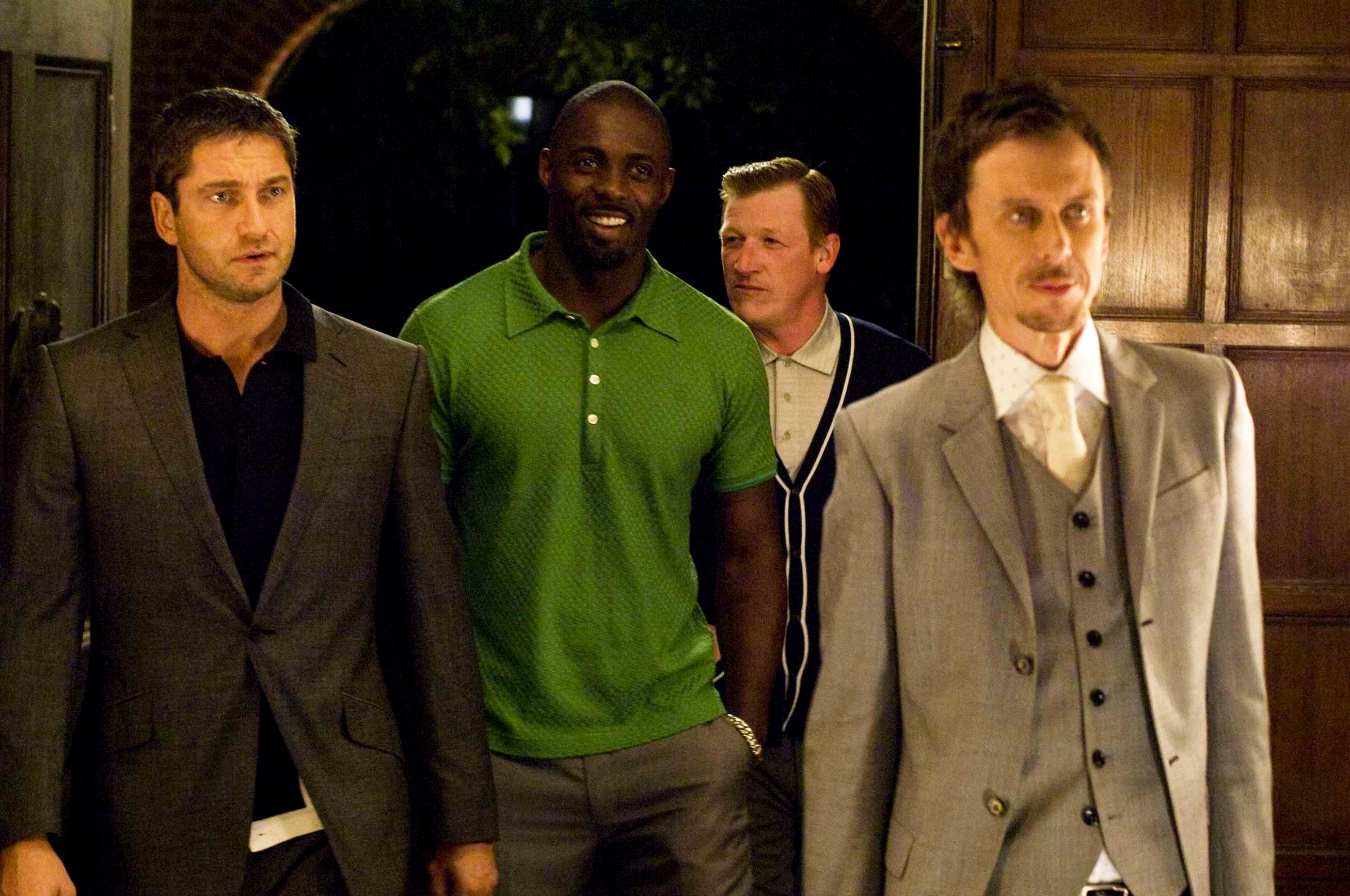 Gerard Butler, Idris Elba, Geoff Bell and Matt King in Warner Bros Pictures' RocknRolla (2008). Photo credit by Alex Bailey.