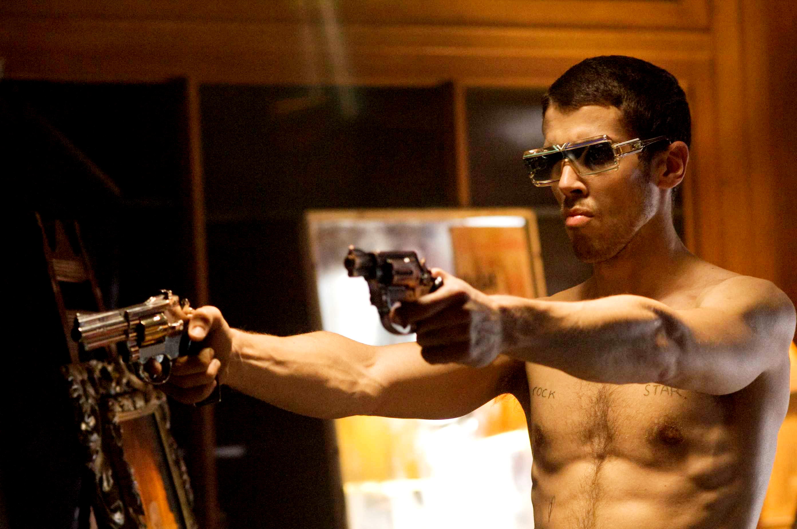 Toby Kebbell stars as Johnny Quid in Warner Bros Pictures' RocknRolla (2008). Photo credit by Alex Bailey.