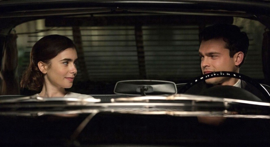 Lily Collins stars as Marla Mabrey and Alden Ehrenreich stars as Frank Forbes in 20th Century Fox's Rules Don't Apply (2016)