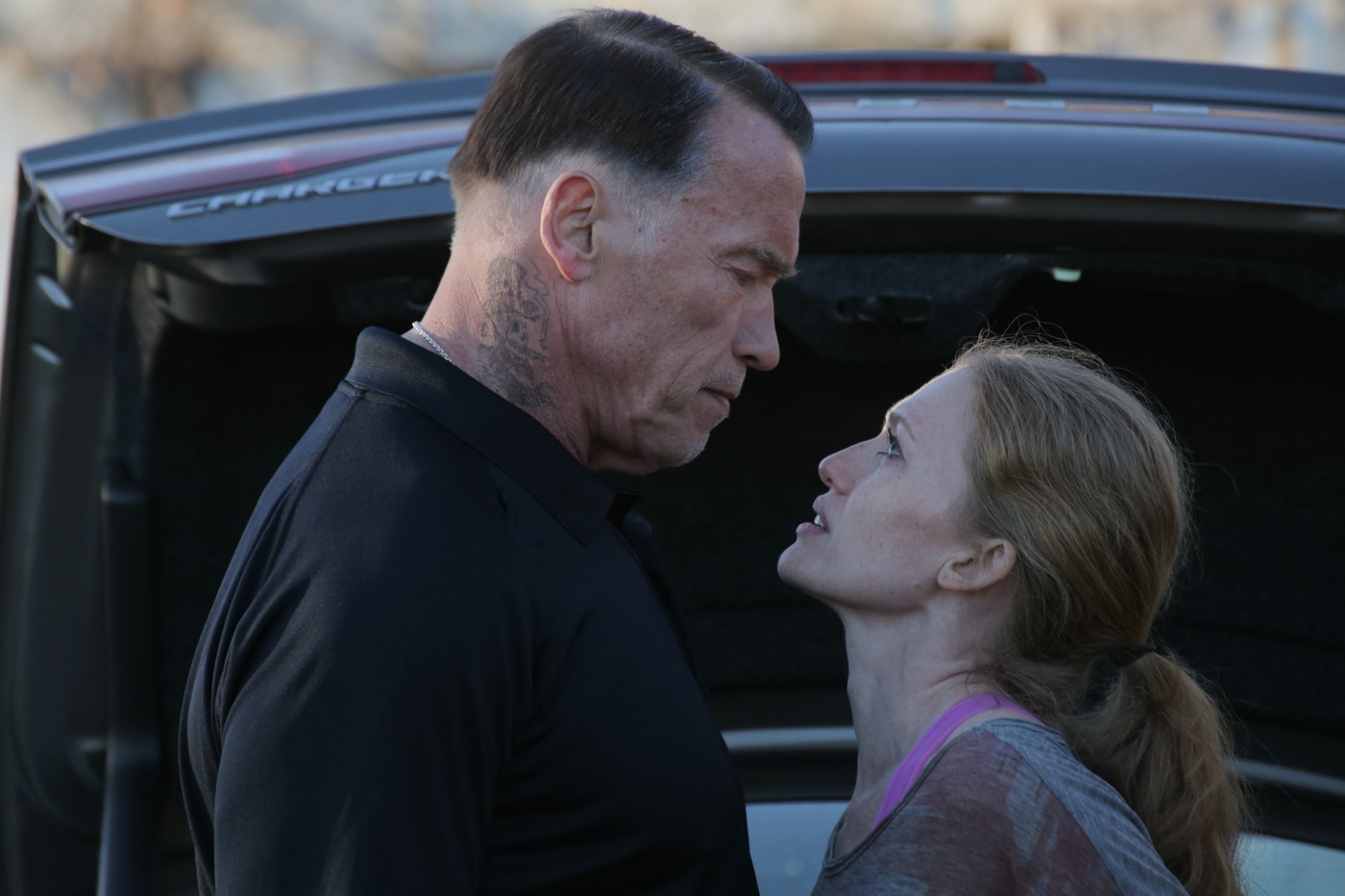 Arnold Schwarzenegger stars as John 'Breacher' Wharton and Mireille Enos stars as Lizzy in Open Road Films' Sabotage (2014)