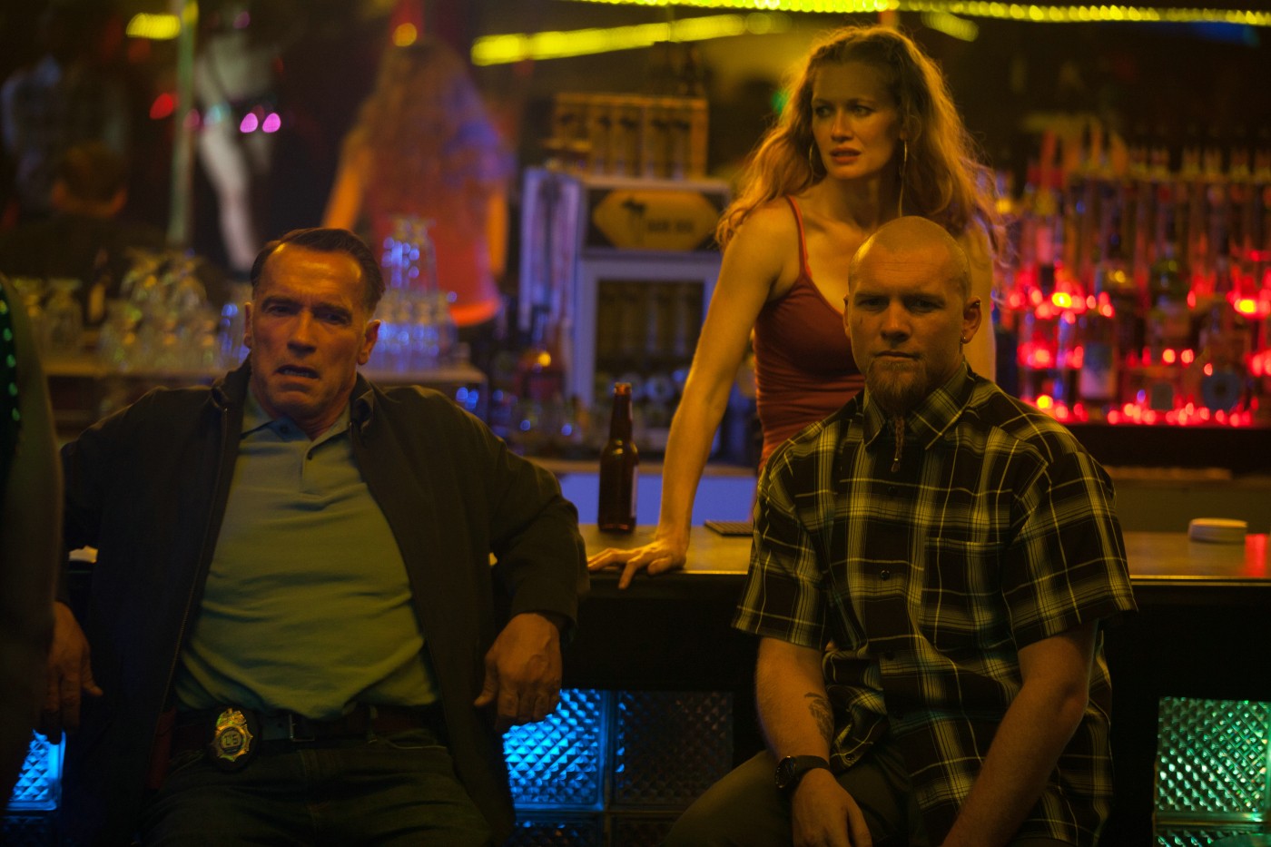 Arnold Schwarzenegger, Mireille Enos and Sam Worthington in Open Road Films' Sabotage (2014)