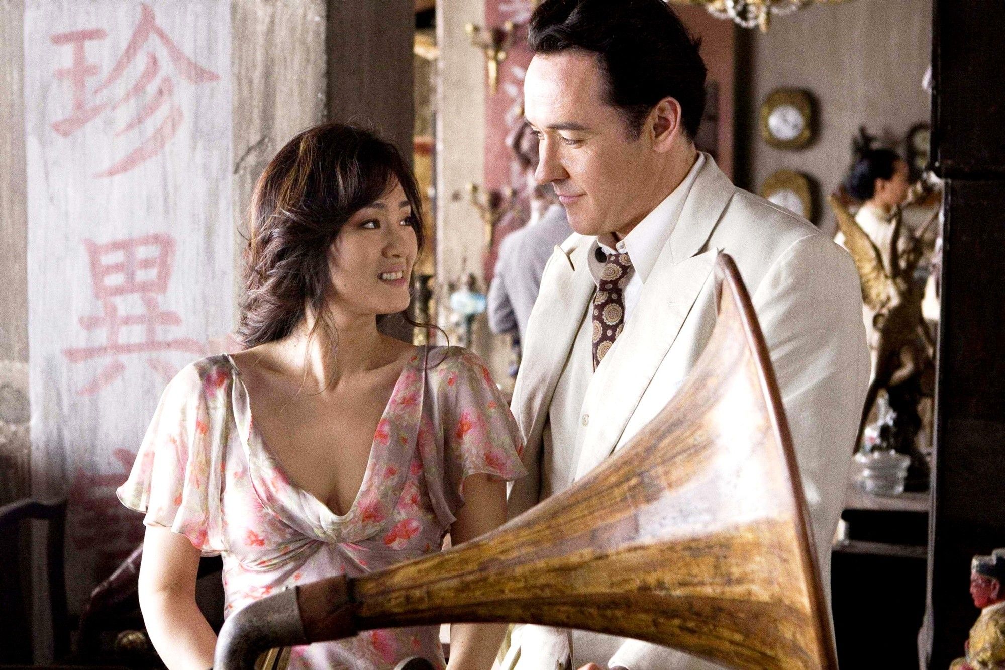Gong Li stars as Anna Lan-Ting and John Cusack stars as Paul Soames in The Weinstein Company's Shanghai (2015)